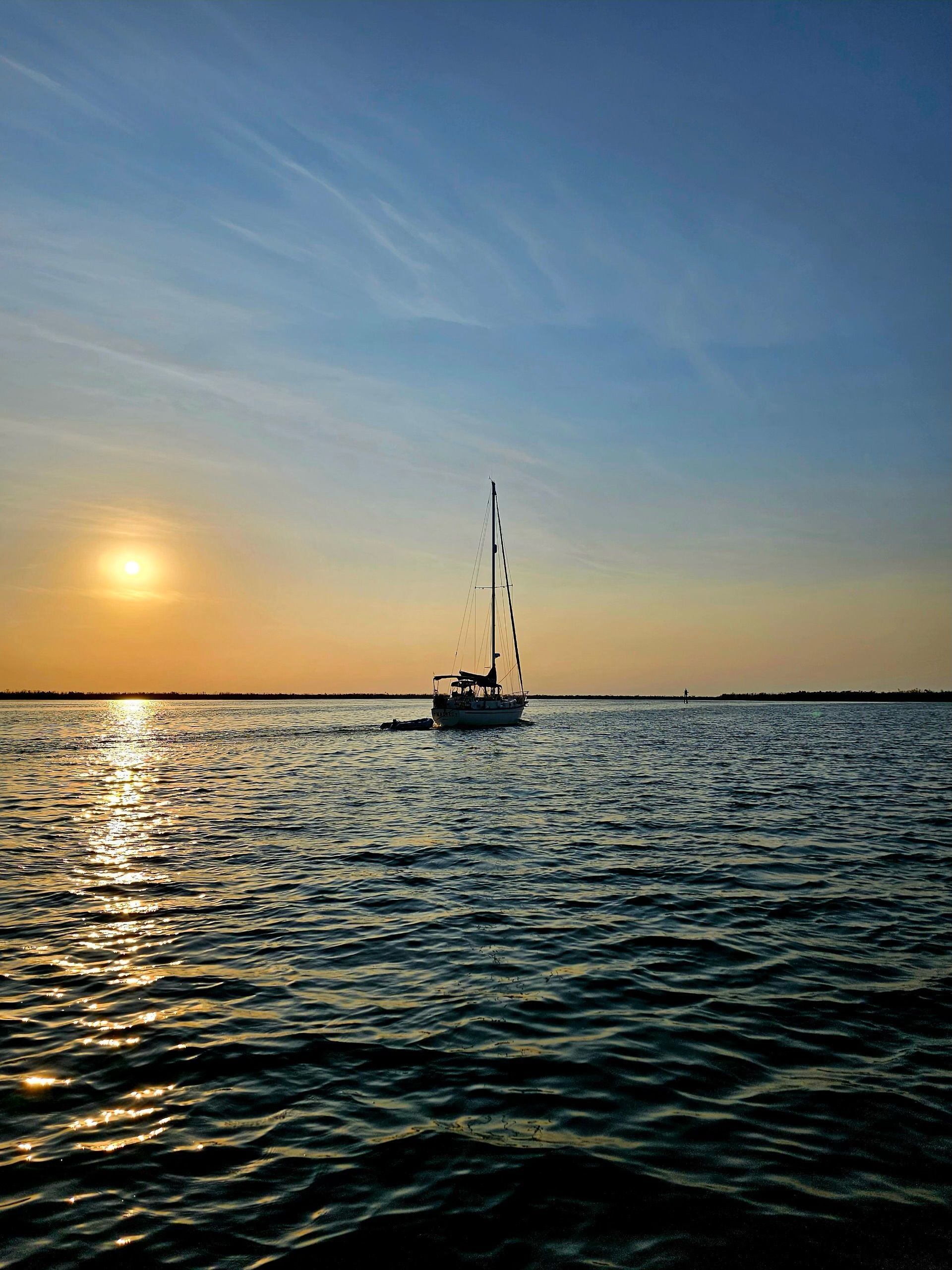Scenic view of Charlotte Harbor with boat in the distance