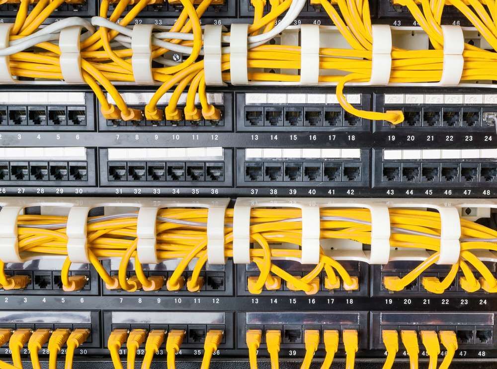 A Bunch of Yellow Wires Are Connected to Each Other on a Wall — Joytech In Adelaide, SA