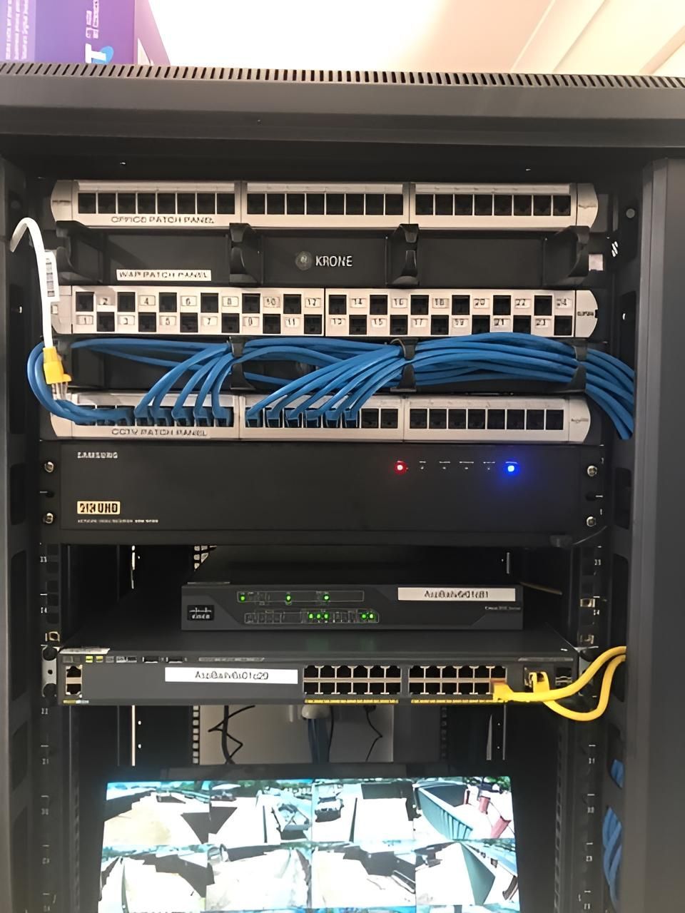 A Server Rack With a Lot of Wires Coming Out of It — Joytech In Adelaide, SA