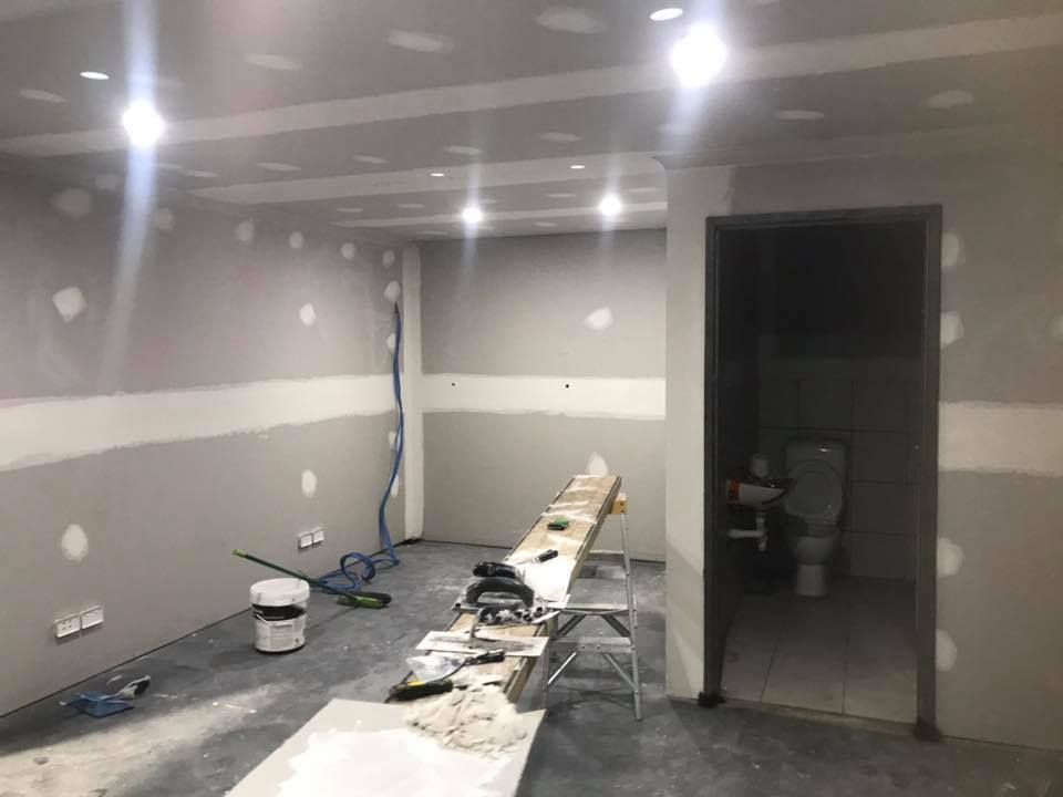 A Room With A Table And A Toilet In It Is Being Remodelled — Joytech In Ciccone, NT