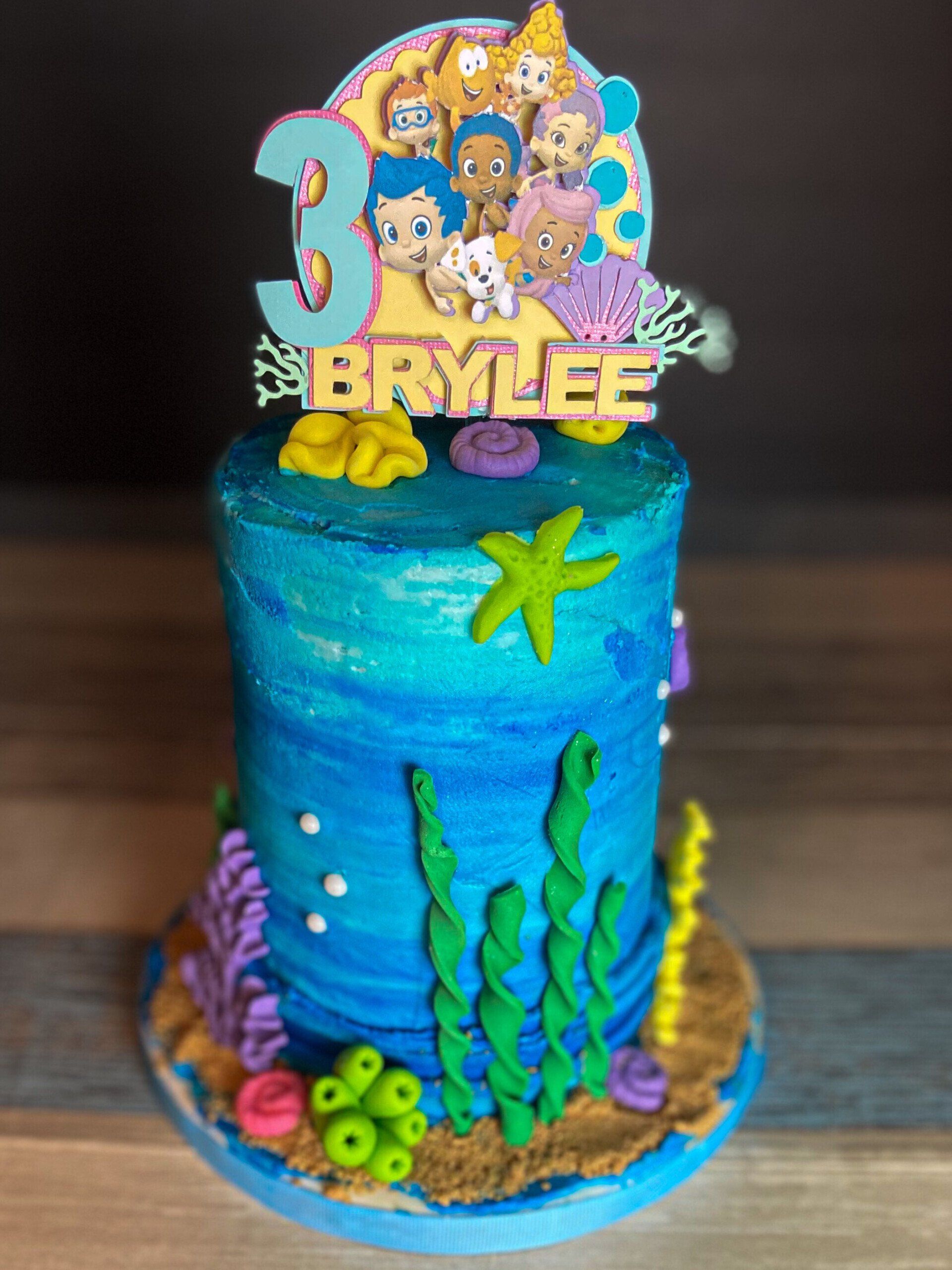 Layer of customize underwater theme cake