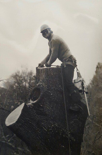 Man Beside COX Banner — Penn Valley, PA — Cox & Co Tree Service Man Beside COX Banner — Penn Valley, PA — Cox & Co Tree Service