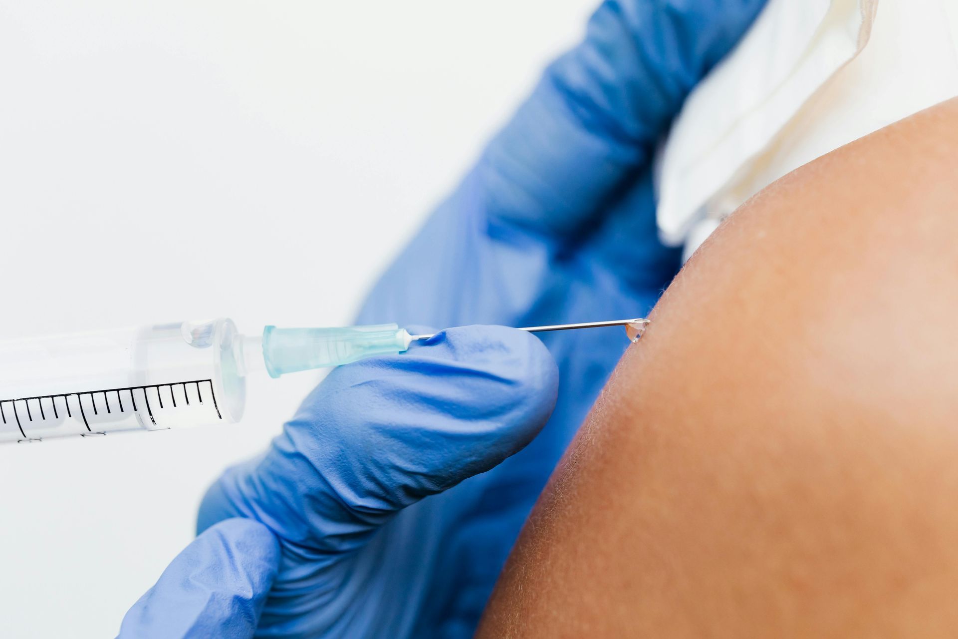 A Woman Is Getting An Injection In Her Arm โ Rural Medical Clinic In Manilla, NSW