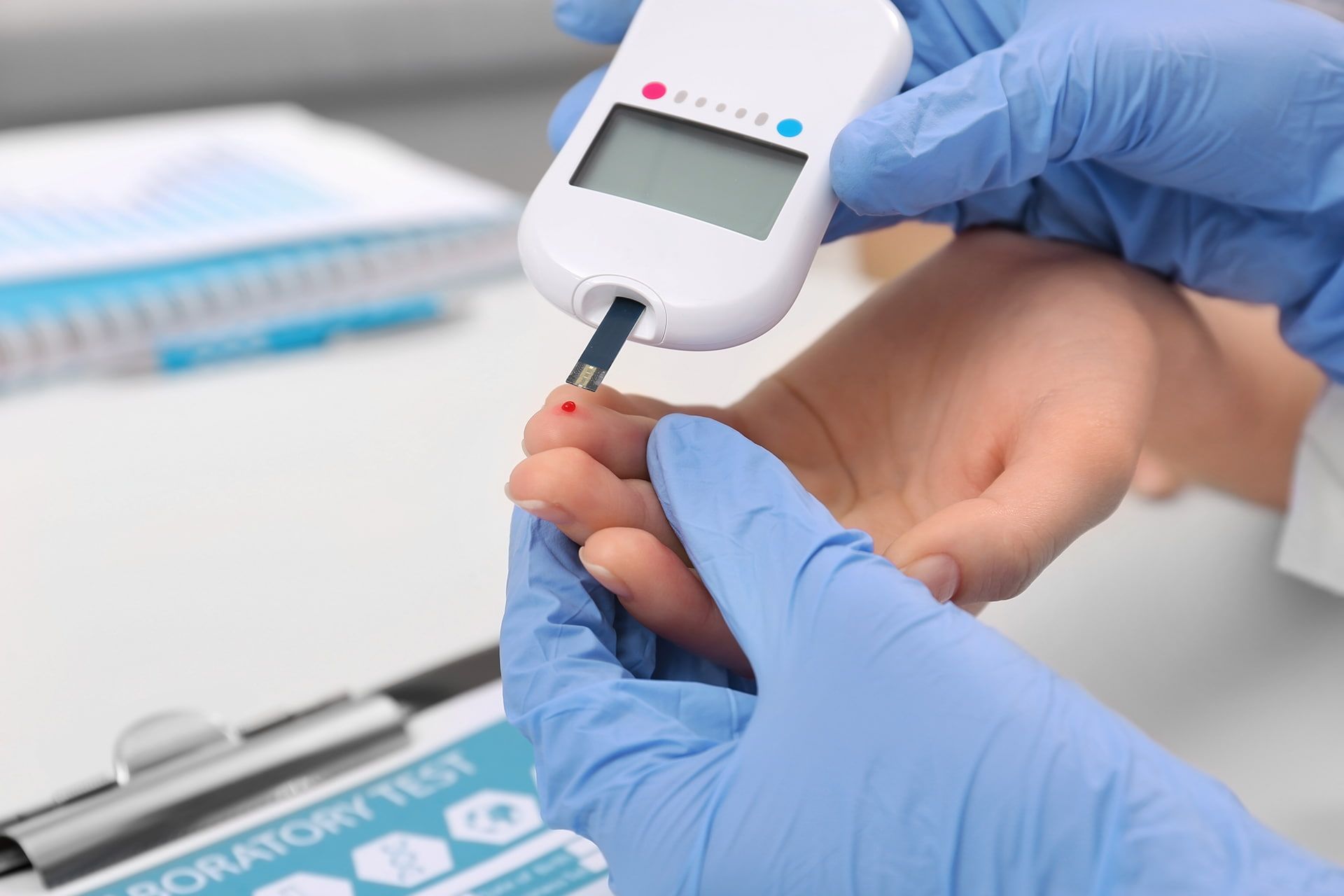 Testing Patient's Glucose Level With Digital Glucometer In Hospital โ Rural Medical Clinic In Manilla, NSW