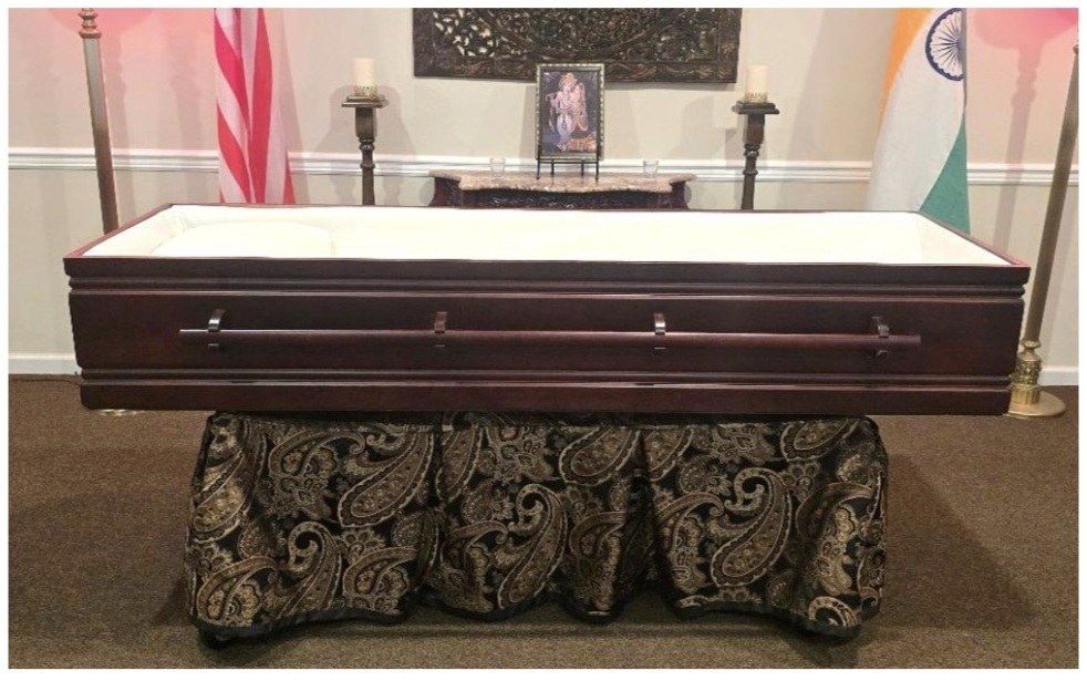 Matthews Tulsi Pine solid wood casket with a lacquer finish