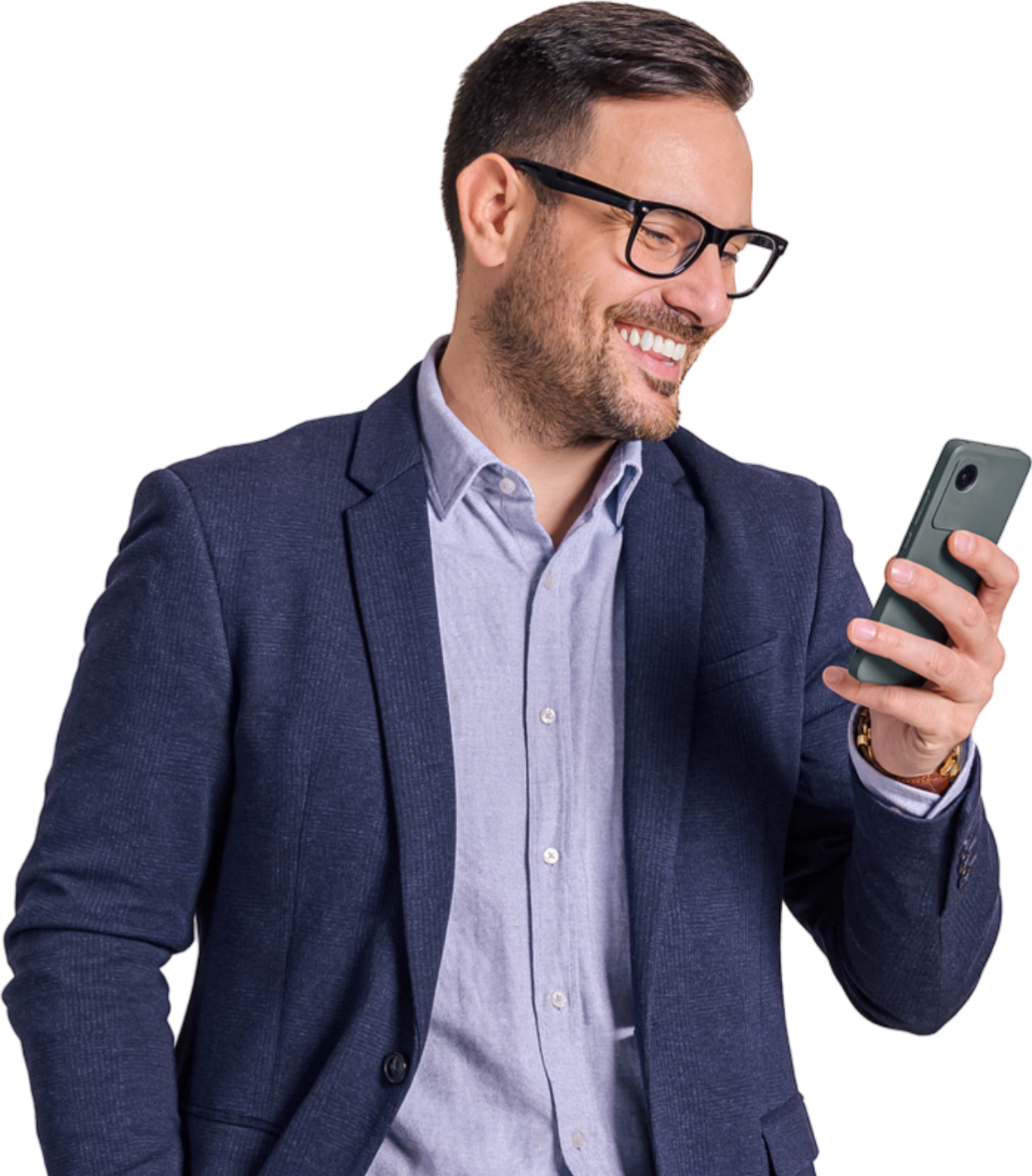 Man in glasses smiles while looking at a smartphone. Wearing a blue blazer and light blue shirt.