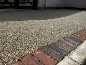 Brown commercial resin driveway job.