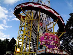 A roller coaster with a sign that says heli skeleton.