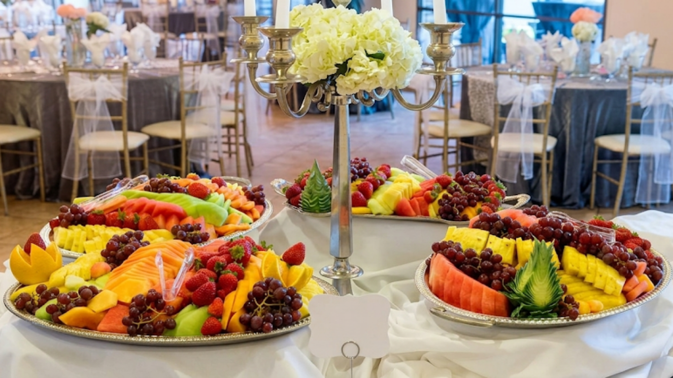 Tray of colorful appetizers being served to guests at an outdoor event