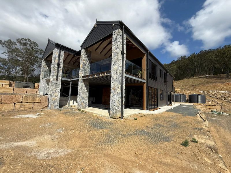 Outside entertainment area featuring a pool - Luxury Home Builder Gold Coast