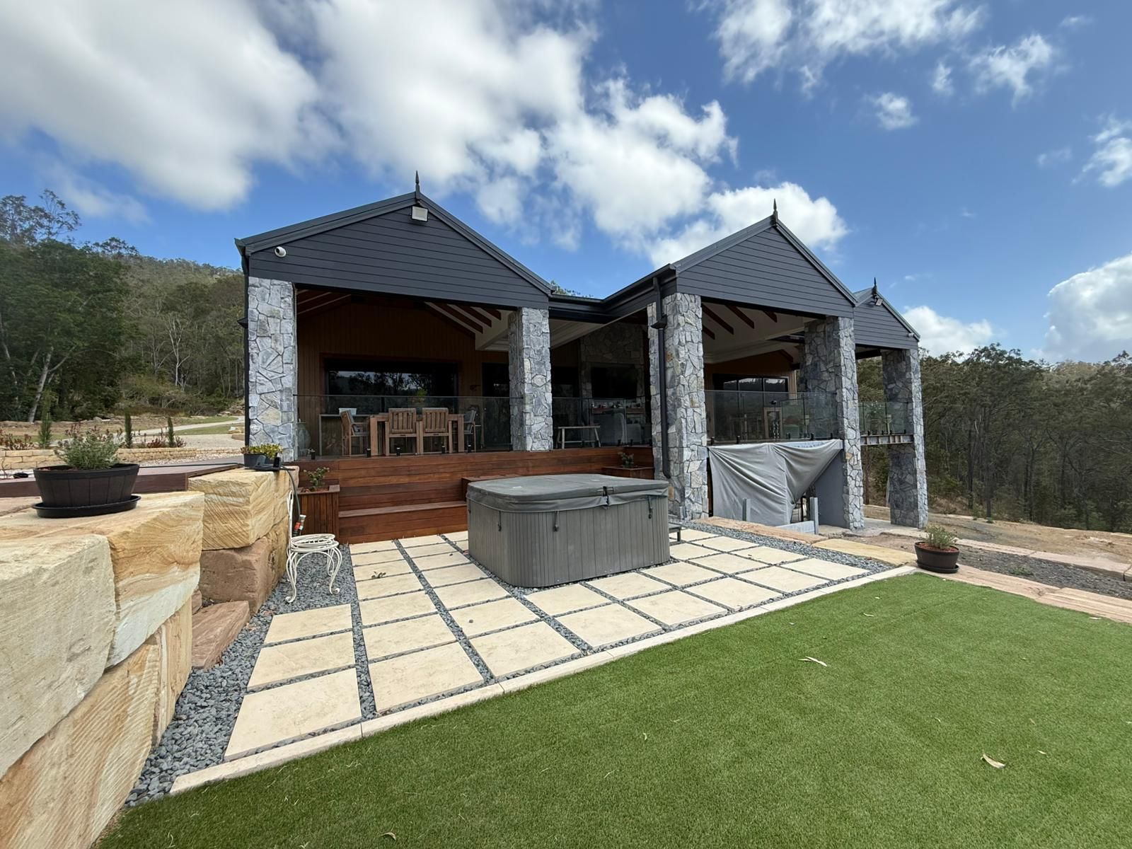 A pool in the backyard of a luxury home - Builder Gold Coast