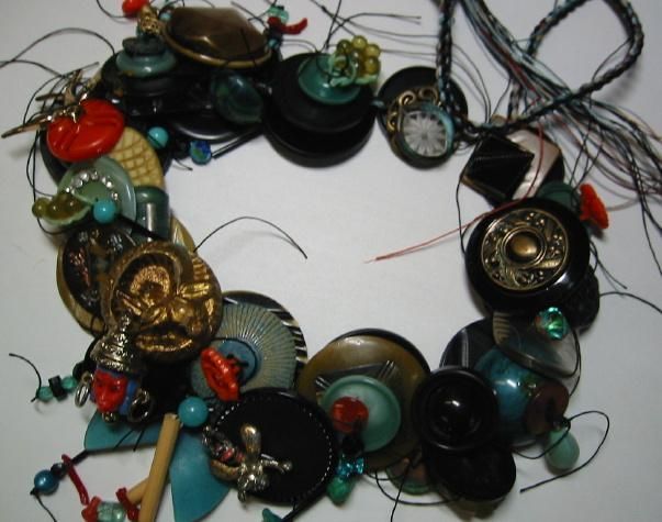 Button necklace, mixed vintage colors and styles, strung together in a circle.