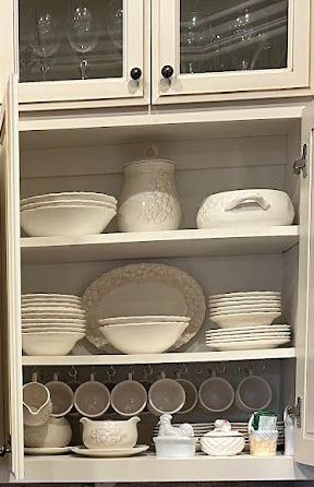 I am loading my everyday dishes back into the cabinet for winter. I love to rotate my dishes and set the table in new ways
