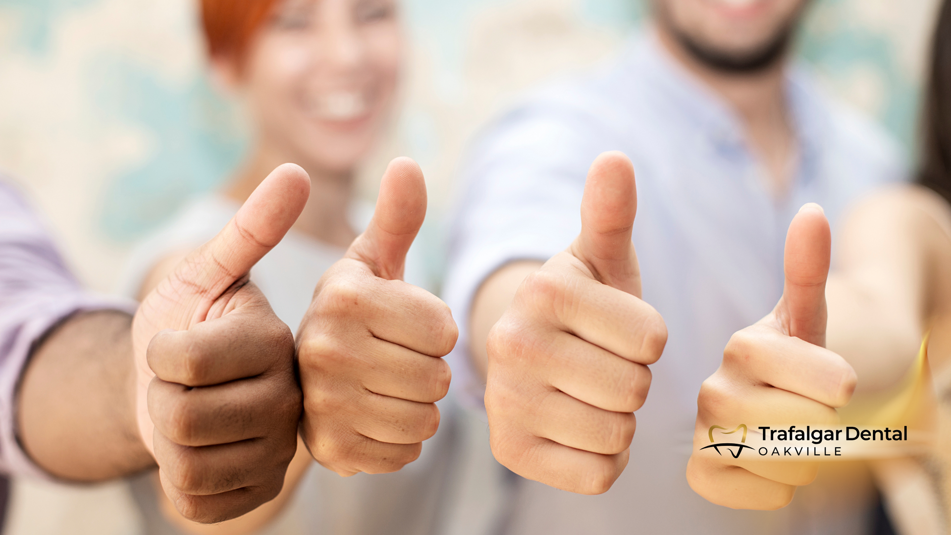 A group of people are giving each other thumbs up.