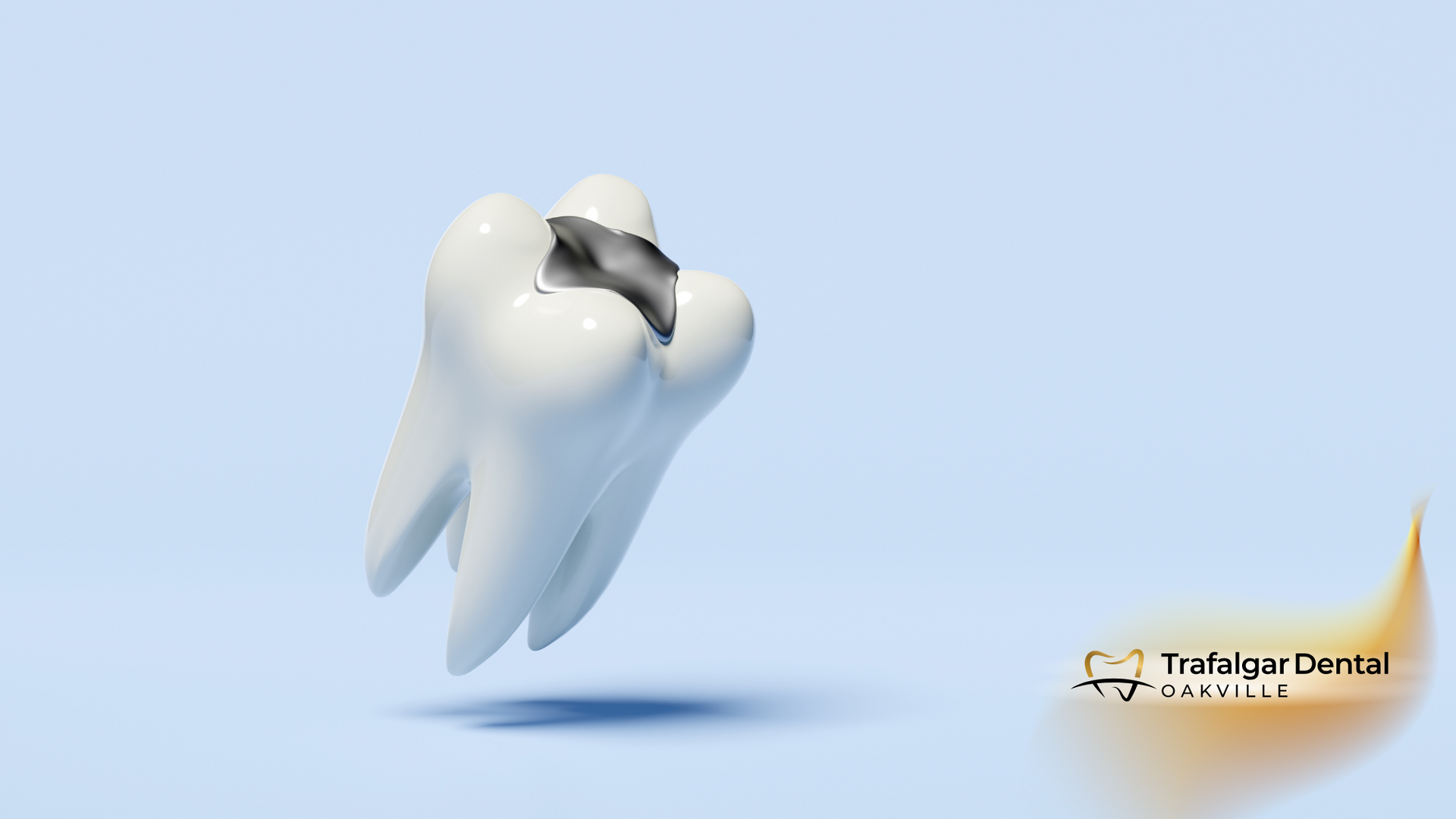 A tooth with a hole in it is floating in the air.