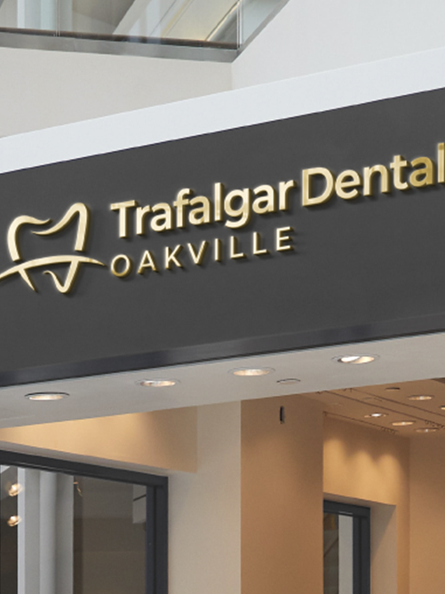 A sign for trafalgar dental in oakville