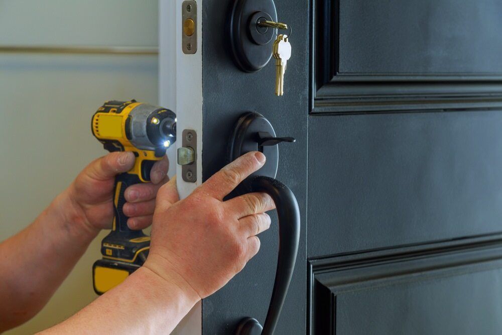 Installing Door Lock — Armstrong Locksmiths Ballarat in Ballarat East, VIC