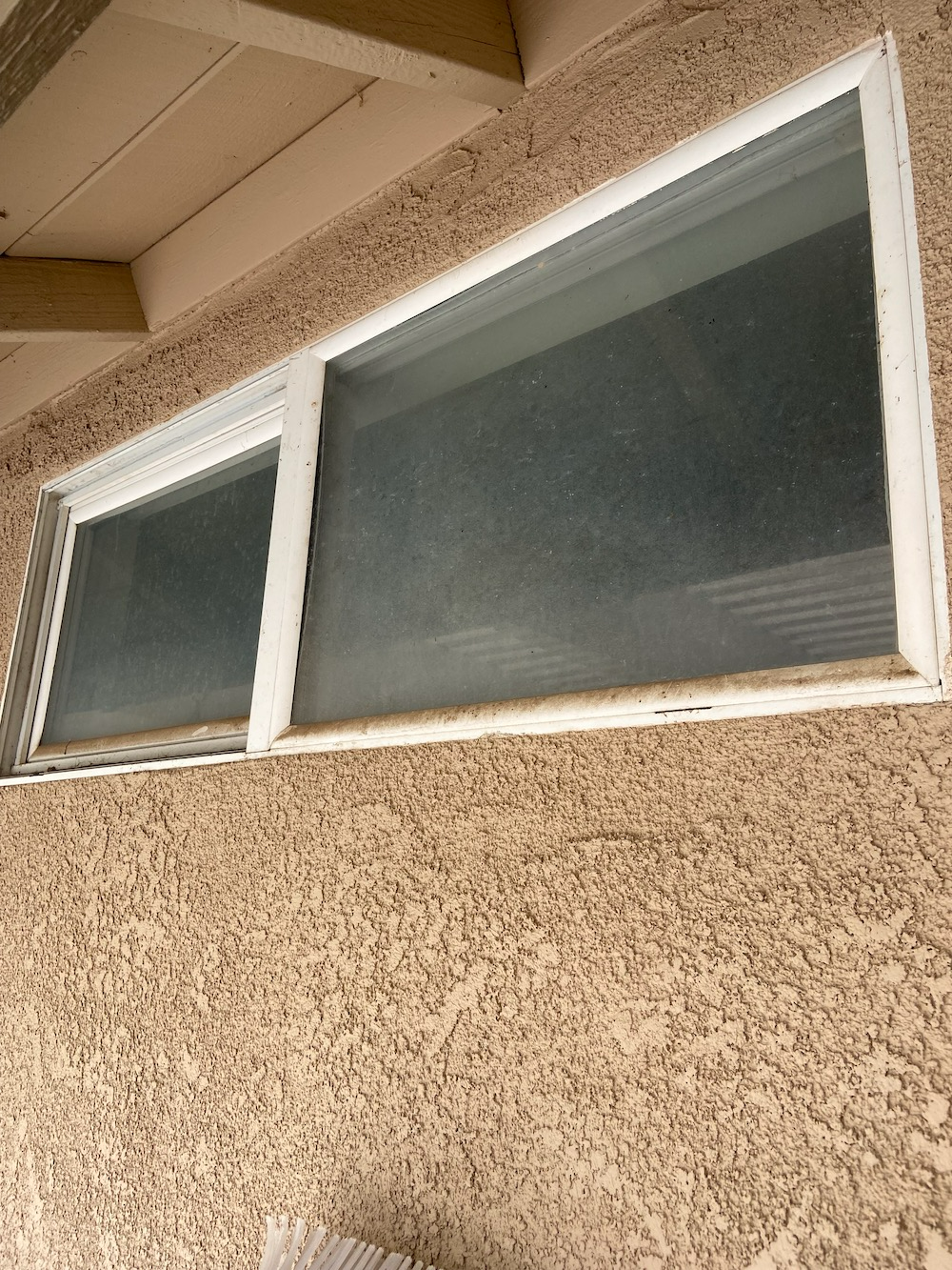 There Is A Window On The Side Of A Building
