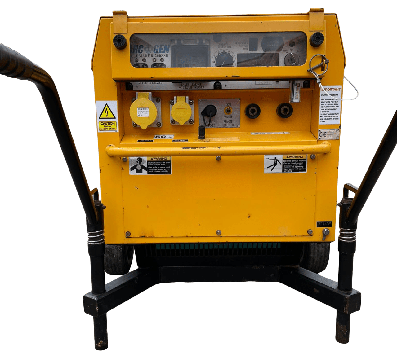 A yellow machine with a warning sign on it