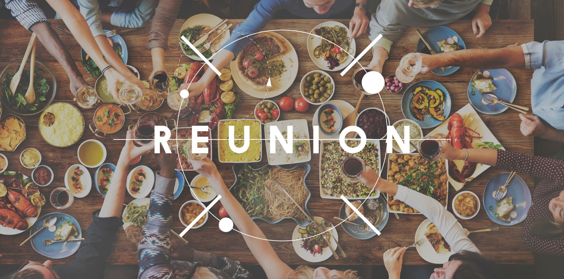 People sharing a meal at a table with the word “REUNION” overlaid