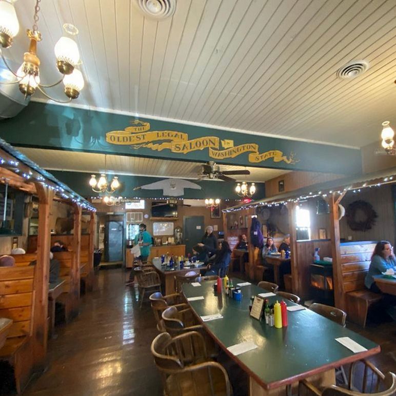 A restaurant with a sign that says oldest saloon