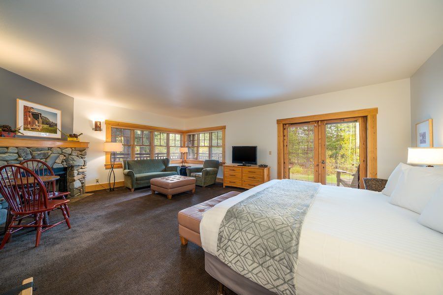 There is a king size bed in the middle of the room.