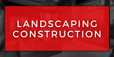 Red sign with white text reading “LANDSCAPING CONSTRUCTION”