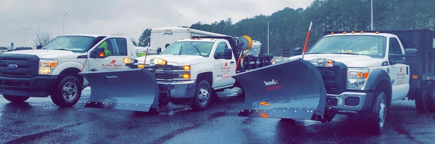 Three pickup trucks collide head-on in a rainy roadside crash with debris scattered across the lane