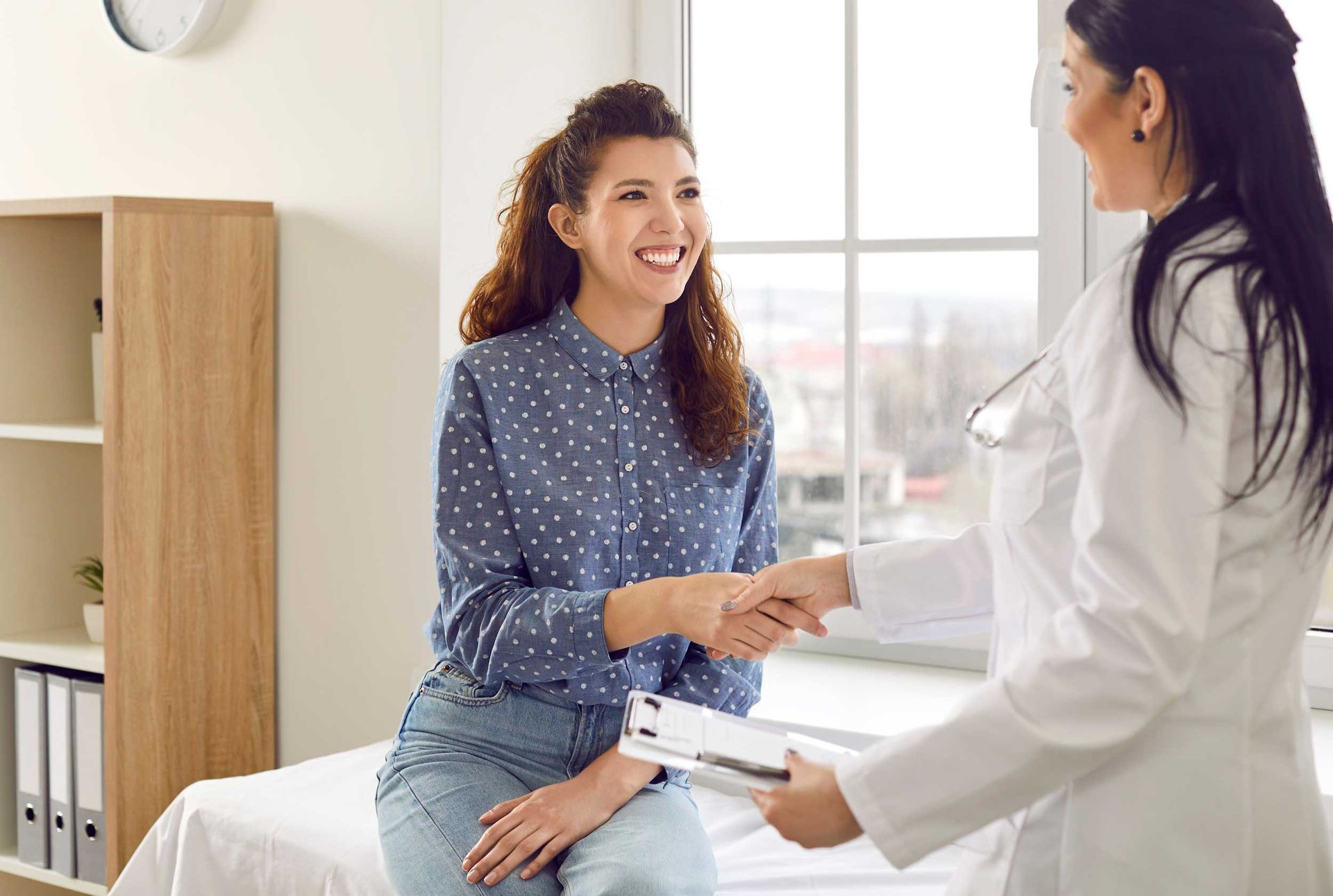 Young woman meeting OB GYN nurse practitioner