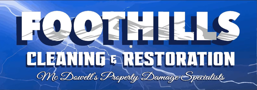 Foothills Construction & Restoration Foothills Cleaning & Restoration logo in white and blue with a mountain silhouette background