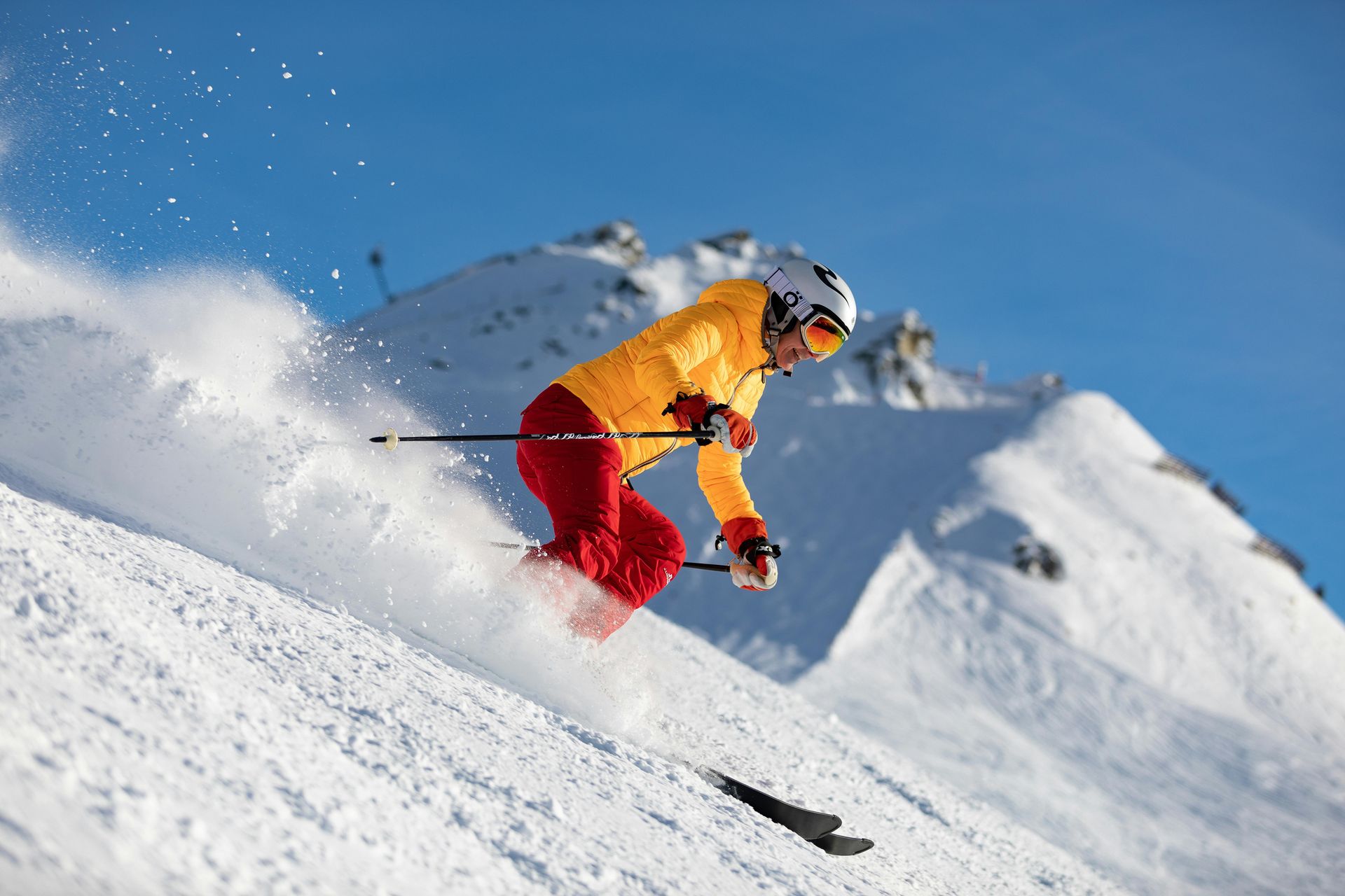 skier going down a mountain