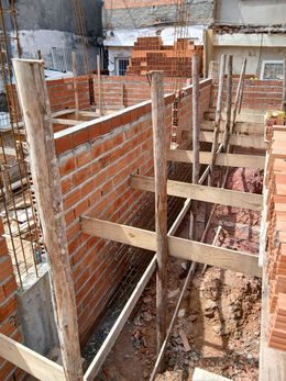 Brick construction with wooden supports, interior shot.