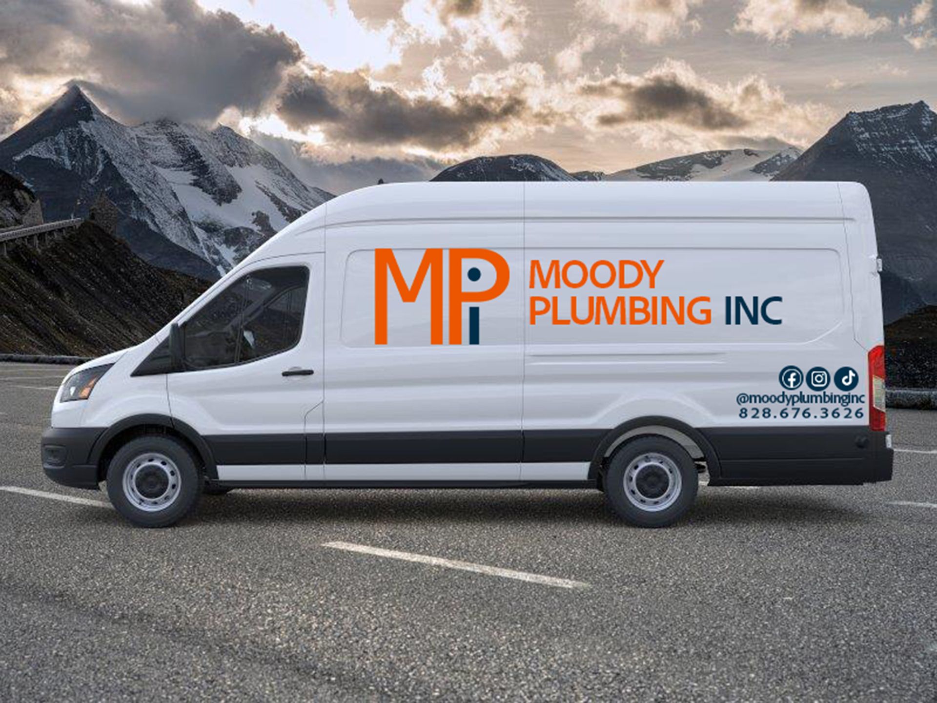 White Moody Plumbing Inc. van parked on a road with mountains in the background