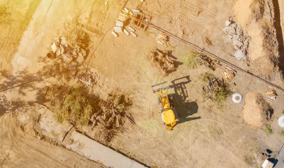 An Aerial View of a Construction Site With a Bulldozer — Zappala Quarries in Innisfail, QLD