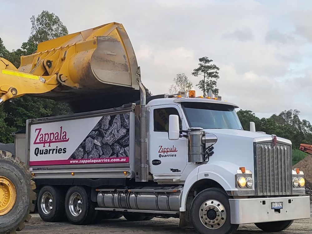 Wheel Loader lined up next to each other — Zappala Quarries in Gordonvale, QLD