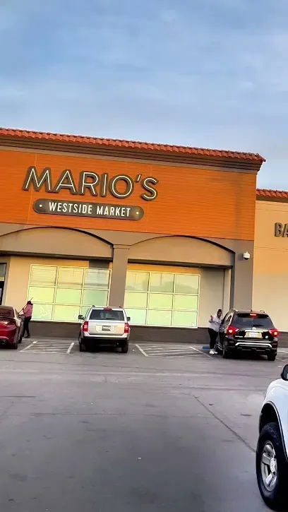A store front with cars parked in front of it.