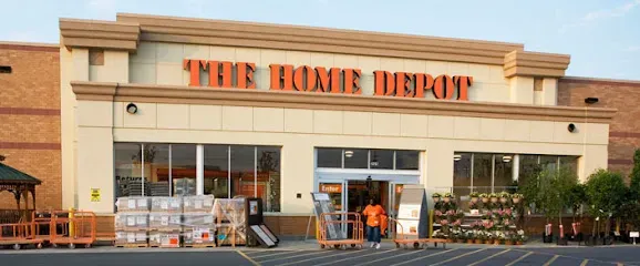 The home depot is a large building with a lot of windows.