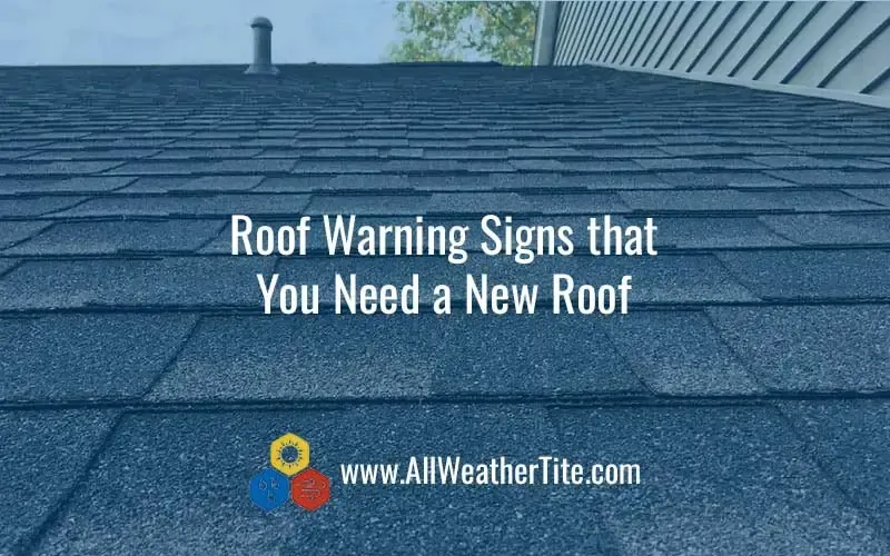 Dark blue shingle roof with text