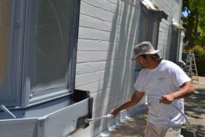 Man Painting House Siding in Napa, CA Man Painting House Siding in Napa, CA