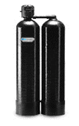 Two black water filtration tanks connected by a pipe, standing upright.
