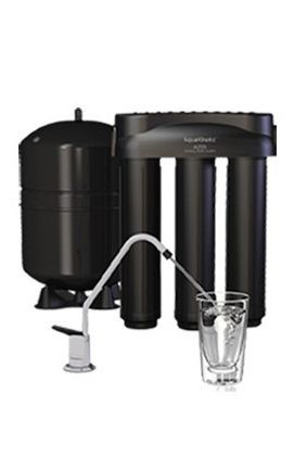 AquaKinetic A200 — Muncie, IN — Oxley Softwater Co. Black water filtration system with faucet, tank, and glass of water.