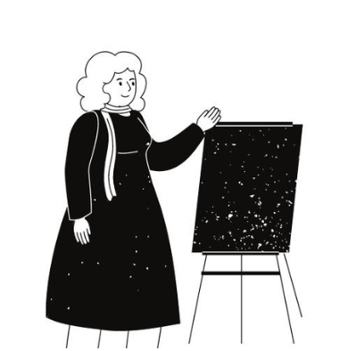 Woman beside a black speckled board, hand raised in a presenting gesture.
