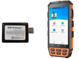 A cell phone with a usb debugger next to it.