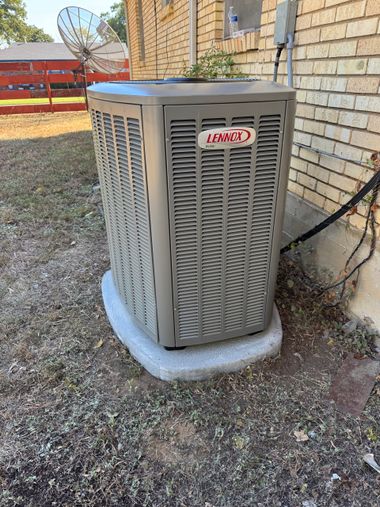 HVAC technician using a tablet to inspect equipment, with a checklist on the screen.