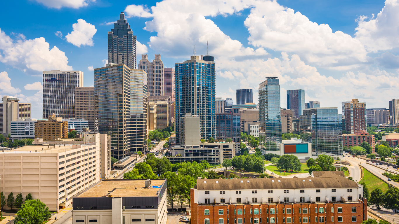 an aerial view of a city skyline with a building that says ' georgia ' on it