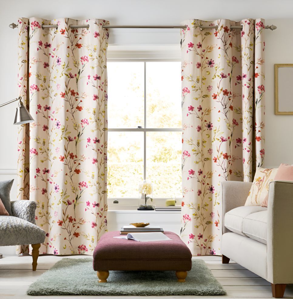 A Living Room With Floral Curtains and a Couch — Newcastle Curtains And Blinds In Warners Bay, NSW