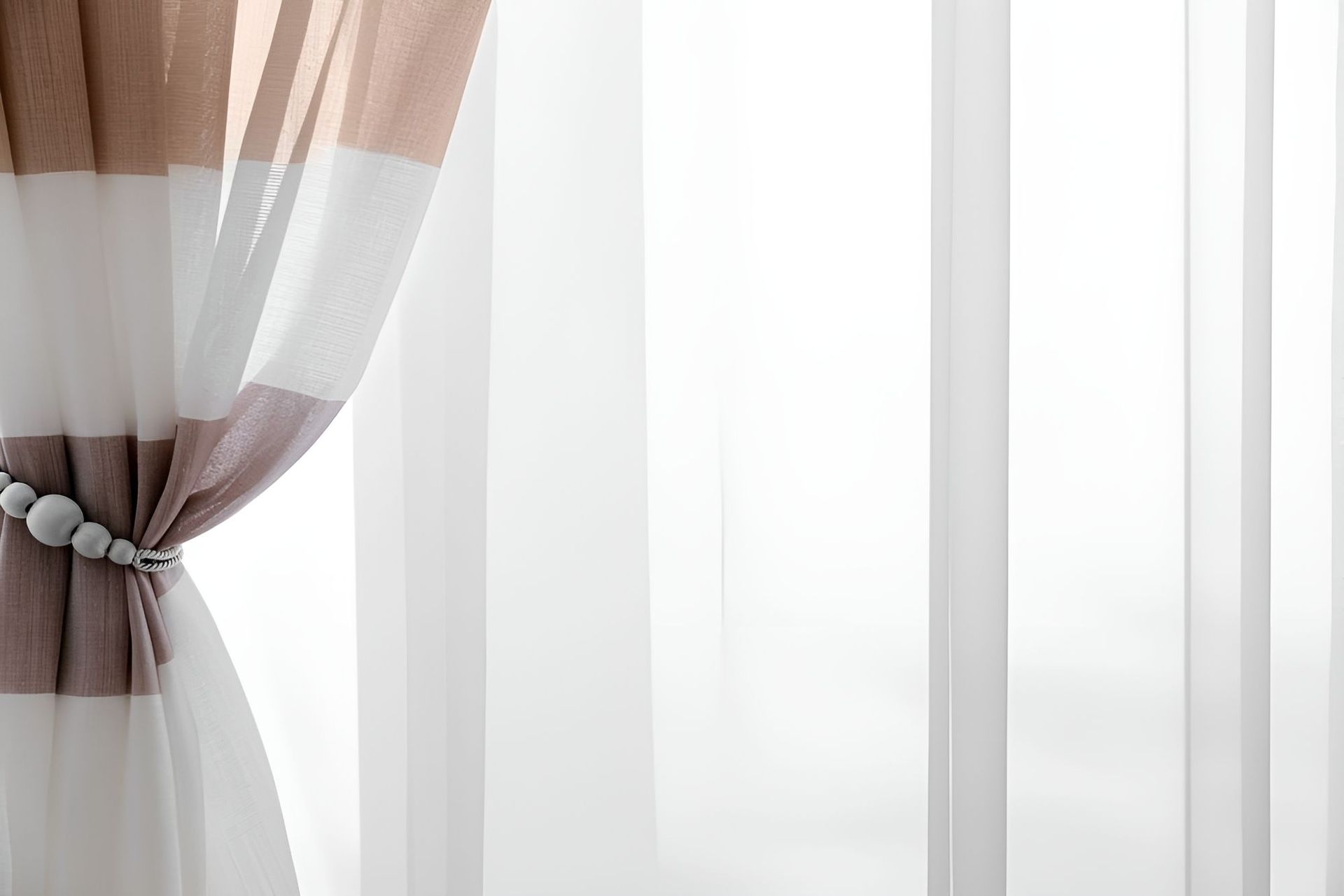 A Close Up of a Pair of Curtains Hanging on a Window — Newcastle Curtains And Blinds In Boolaroo, NSW