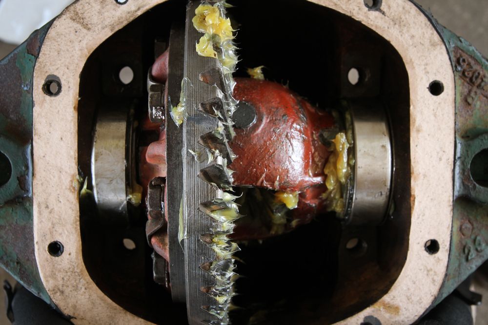 A Close Up of the Inside of a Gearbox With Grease on It — North Queensland Independant Fuel Services in Slade Point, QLD