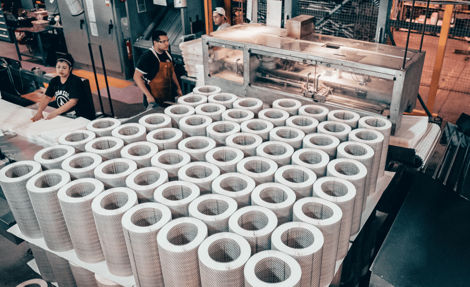Rows Of Cylindrical Air Filters On A Factory Floor — North Queensland Independant Fuel Services in Slade Point, QLD