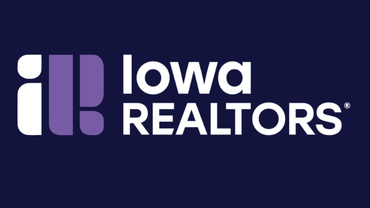 Iowa REALTORS logo in white and purple on a dark blue background